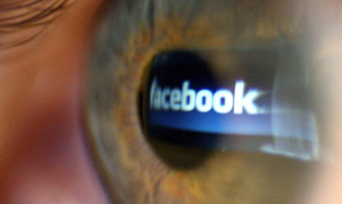 File photo dated 8/3/2009 of the logo of social networking website Facebook seen reflected in a person's eye. ... Facebook profits ... 29-01-2015 ... London ... UK ... Photo credit should read: Dominic Lipinski/PA Wire. Unique Reference No. 22084945 ... Issue date: Thursday January 29, 2015. The social networking giant said its advertising revenue grew by 53% to 3.6 billion US dollars in the final quarter compared to a year ago, as increasing numbers use the company to stay in touch with friends and family. See PA story CITY Facebook. Photo credit should read: Dominic Lipinski/PA Wire