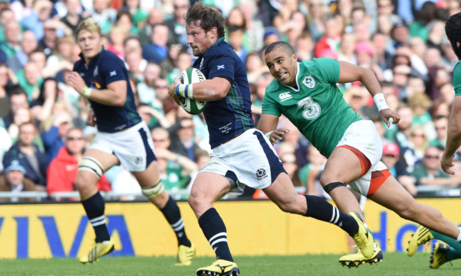 Peter Horne scoring for Scotland against Ireland in August.