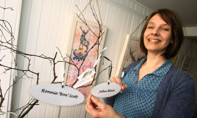 Jenny Blair beside her family tree creation at the Bank Street Gallery, Kirriemuir.