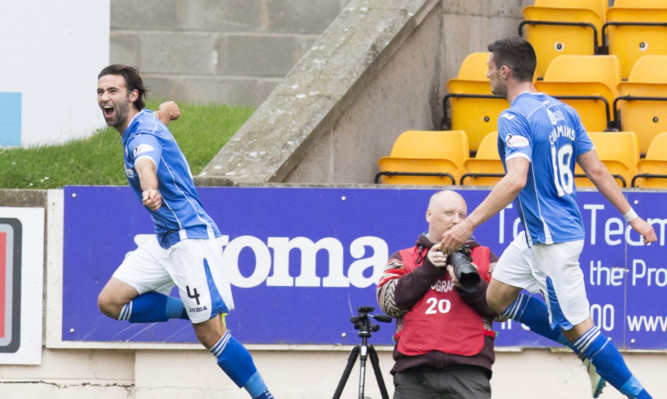 Simon Lappin (left) celebrates making it 2-1 for Saints against United. The game marked the end of Jackie McNamara's time at Tannadice.