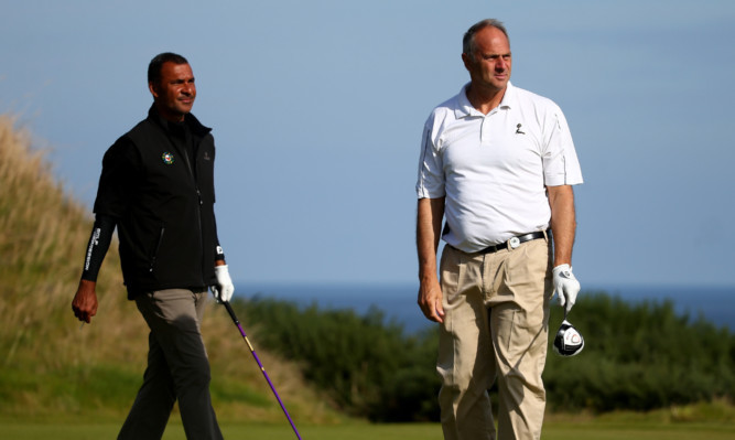Sir Steve Redgrave (right) with Ruud Gullit at the 2014 Alfred Dunhill Links Championship at the Kingsbarns Golf Club