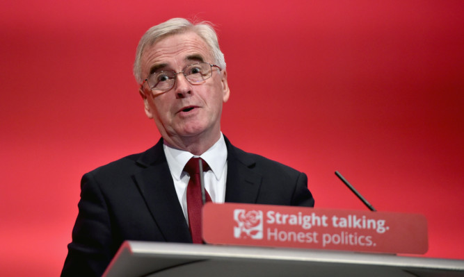 John McDonnell addresses the Labour Party autumn conference in Brighton.