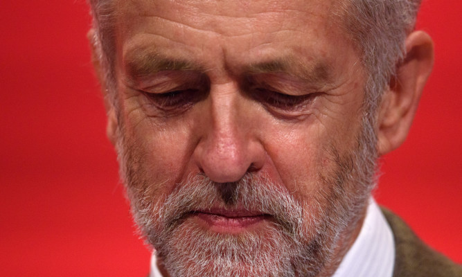 Labour leader Jeremy Corbyn speaking at conference.