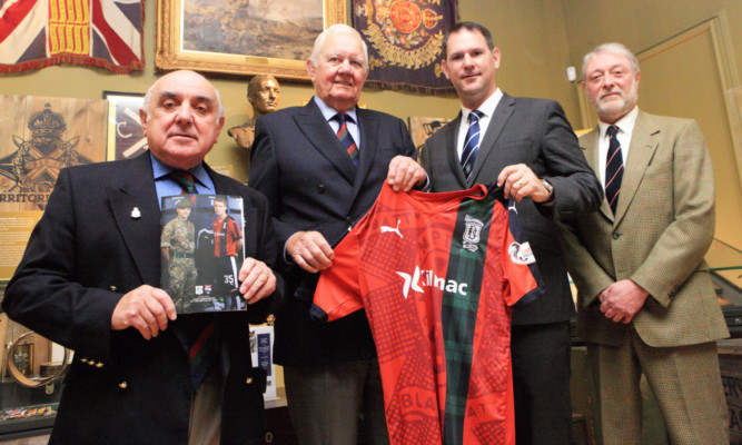 Major Ronnie Proctor, secretary of The Black Watch Association, Colonel Alex Murdoch, chairman of The Black Watch Association, John Nelms, managing director of Dundee FC, and Bob Hynd, director of Dundee FC.