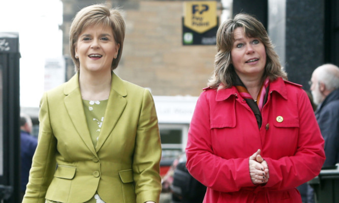First Minister Nicola Sturgeon says the party had no knowledge of Michelle Thomson's business dealings.