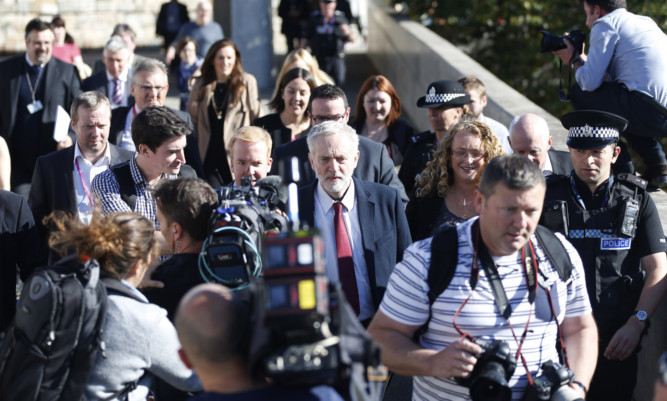 Labour party leader Jeremy Corbyn and Scottish Labour leader Kezia Dugdale (centre at rear) outside the Scottish Parliament.