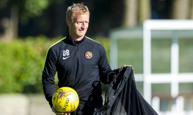 Dundee United caretaker boss Dave Bowman oversees training.