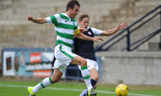 James Craigen challenges Celtic's Eoghan O'Connell.