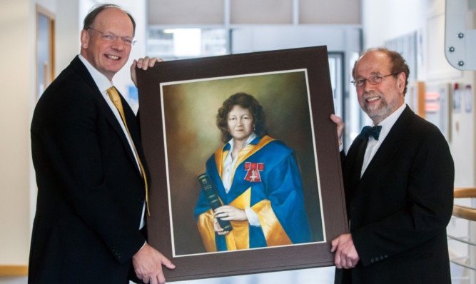 Professor Sir David Lane (left) and Professor Roland Wolf officially open the Jacqui Wood Cancer Centre at Ninewells Hospital.