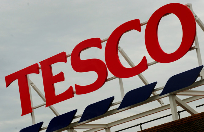 General view of Tesco supermarket logo in Ashby De La Zouch, Leicestershire. PRESS ASSOCIATION Photo. Picture date: Wednesday  August 1, 2012. See PA story. Photo credit should read: Rui Vieira/PA Wire