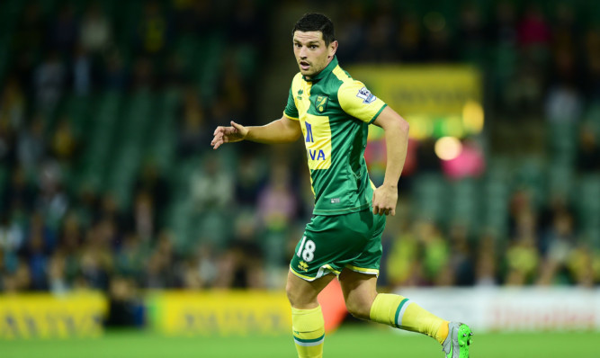 Norwich midfielder Graham Dorrans has been called up to the Scotland squad for the Euro 2016 qualifiers against Poland and Gibraltar.