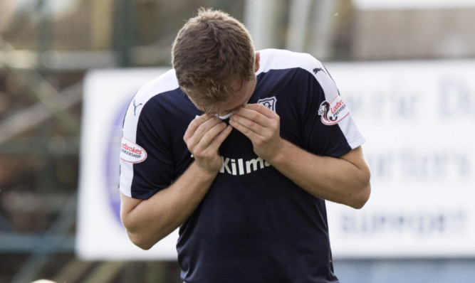 A dejected Greg Stewart limps off on Saturday.