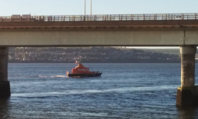 The lifeboat crews are searching the Tay.