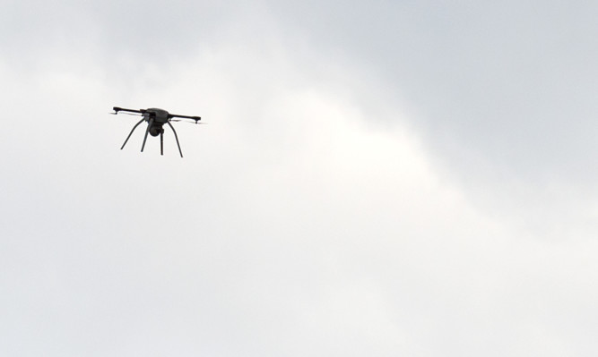 LONDON, ENGLAND - SEPTEMBER 15:  A drone is on display during the Defence and Security Exhibition 2015 at ExCel on September 15, 2015 in London, England. This year the Defence and Security Exhibition (DSEI) has over 1,500 exhibitors spanning air, navy and land based military, medial and unmaned systems and equipment  (Photo by Ben Pruchnie/Getty Images)