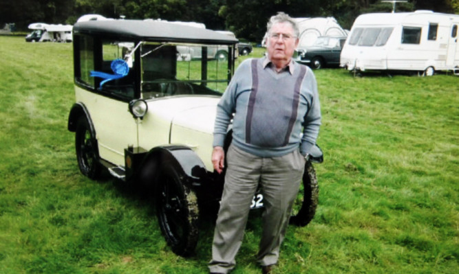 William Sutherland had a passion for restoring and displaying vintage cars.