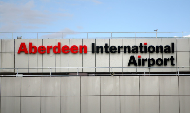 Kris Miller, Courier, 09/06/14. Picture today shows the sign for Aberdeen International Airport for files.