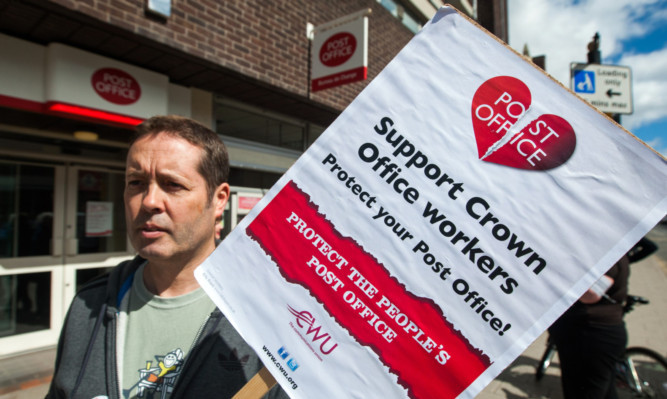 CWU Counters Area Representative David McCloy outside the post office on South Street, Perth, during the strike this week.