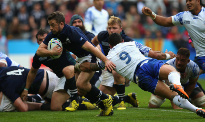 Greig Laidlaw dodges inside his opposite number to score Scotland's crucial third try.