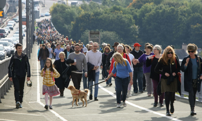 Police say about 600 people attended the Hands Across the Forth event.