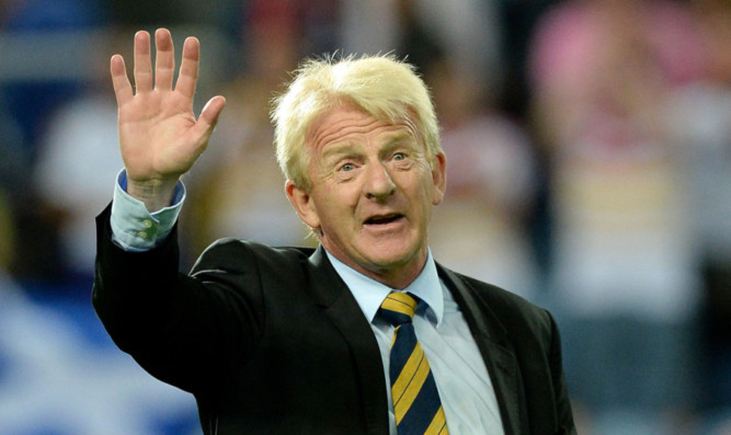 Scotland boss Gordon Strachan acknowledges the support of the Tartan Army after the full-time whistle.