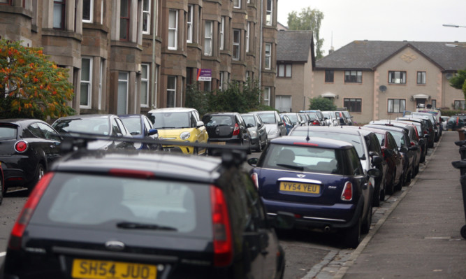 The volume of cars left throughout the working day on streets like Bellfield Avenue is causing problems for residents.