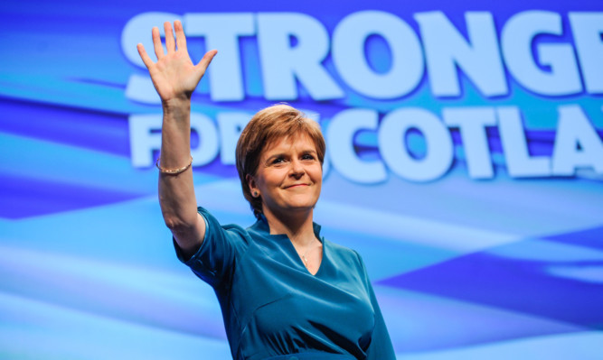 Nicola Sturgeon gives her opening speech on the first day of the SNP Conference in Aberdeen
