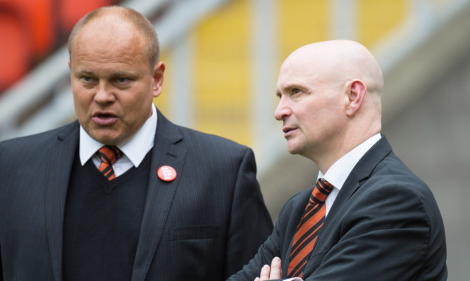 Mixu Paatelainen (left) chats to chairman Stephen Thompson after the game.