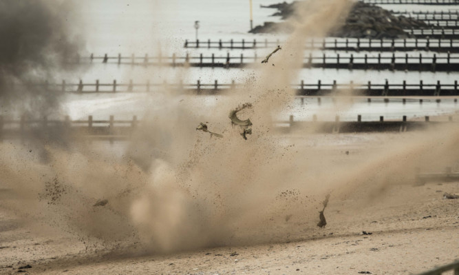 An arny bomb disposal team was called to Aberdeen after the device was discovered on the beach.