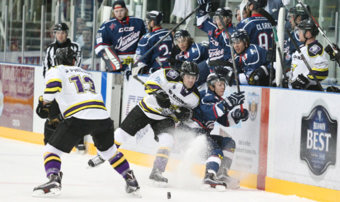 Dundees Craig Moore and Vinny Scarsella of Manchester battle on the boards.