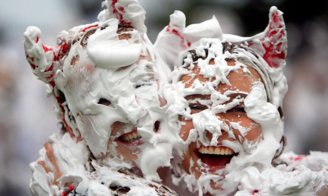 Two of the students enjoying the foam fight.