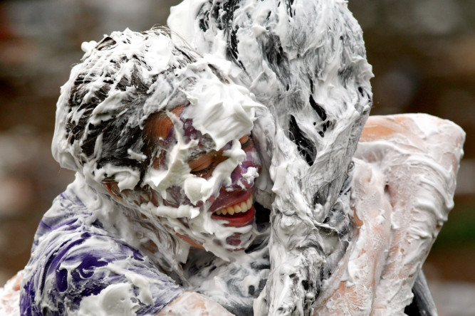 Students at St Andrews University got into a lather at the Raisin Monday foam fight. The traditional event, an annual favourite with both students and Gillette shareholders, saw hundreds of people descend on the Lower College Lawn for the sensational spectacle on October 19.