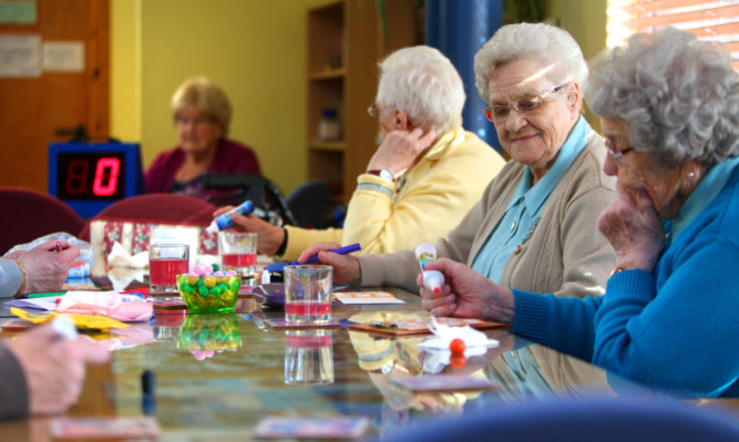 Residents enjoying a game of bingo at the Andy Stewart Sheltered Housing Complex