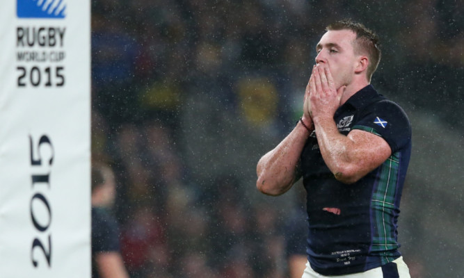 Stuart Hogg reacts at no-side at Twickenham on Sunday.