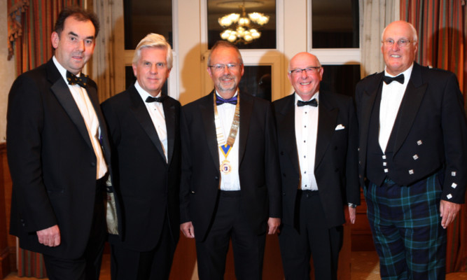 From left: master of ceremonies Jim Patrick, Steve Rider, club president David Laing, Ian Shuttleworth and charity auctioneer David Adam.