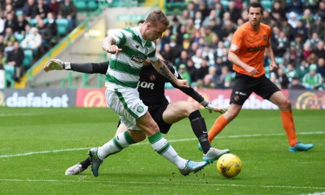 Leigh Griffiths slots home the first goal.
