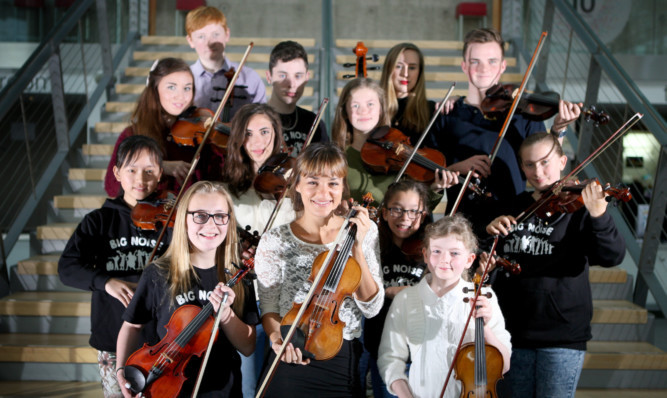 Nicola with Milena Kriz and other aspiring young musicians.