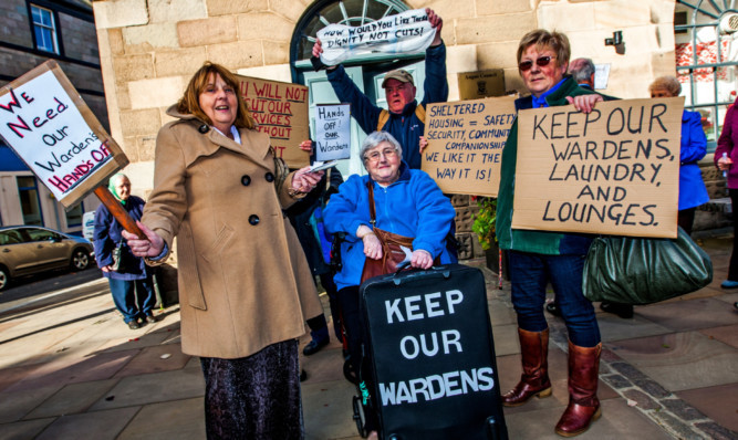 Protesters gathered in Forfar to demonstrate againsy the changes.