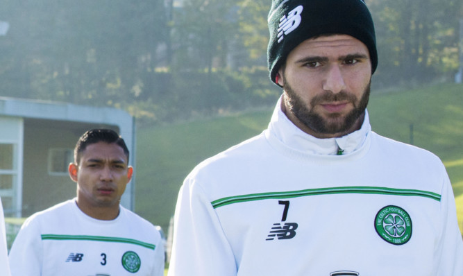 Celtic's Nadir Ciftci (right) and Emilio Izaguirre in training.