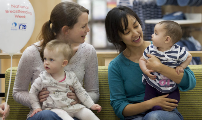 Latest figures show fewer mothers in Tayside are breastfeeding their children.