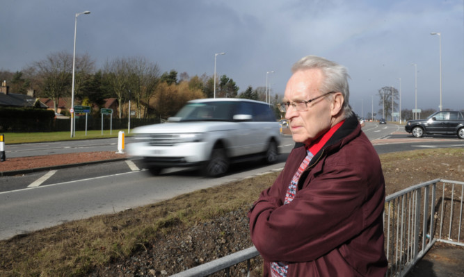 Progress: Mr Page beside the Balfarg junction.