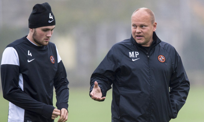 Mixu Paatelainen has a word with John Souttar in training.