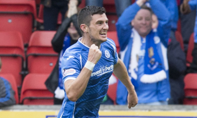 Graham Cummins celebrates a goal against Dundee United.