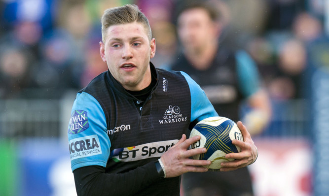 Finn Russell in action for Glasgow Warriors.