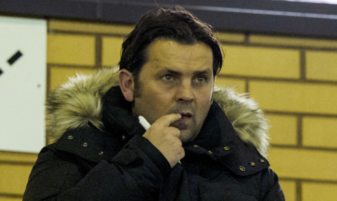Paul Hartley took in Inverness's game against Ross County on Tuesday night.