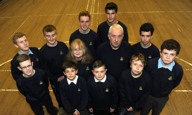 WO Cynthia Fleming and Captain Steve Donaldson, centre, with some of the members in the BB Hall, Kinnessburn Road, St Andrews.