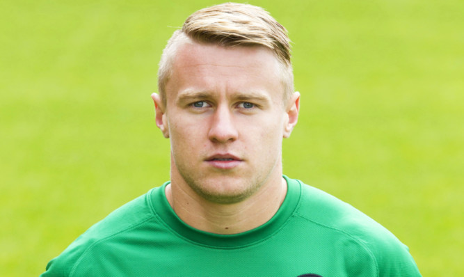 Michal Szromnik was between the sticks for United against Ross County on Saturday.