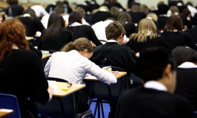 Pupils at Willamwood High School attend a math class on February 5, 2010 in Glasgow, Scotland. As the UK gears up for one of the most hotly contested general elections in recent history it is expected that that the economy, immigration, the NHS and education are likely to form the basis of many of the debates.