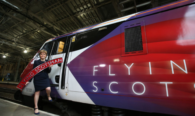 First Minister Nicola Sturgeon helped launch the Virgin Train Flying Scotsman at a ceremony at Edinburgh Waverley Station.