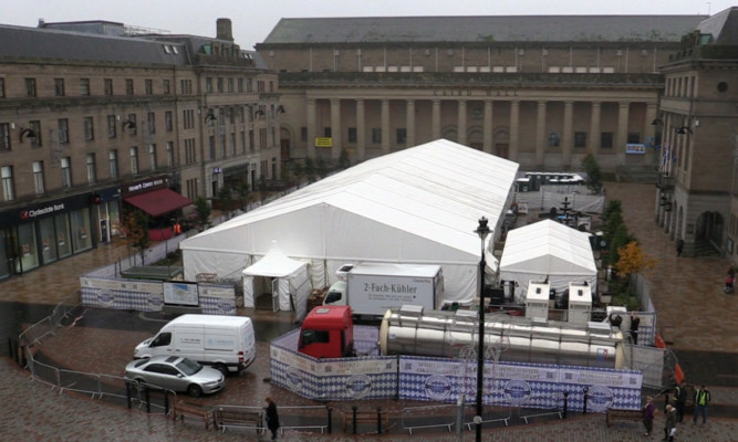 The massive tent  and lorry full of beer  in the City Square.