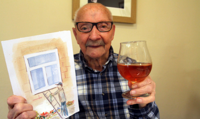 Robert 'Gerry'  Morrison celebrating turning 100 with his card and birthday drink.